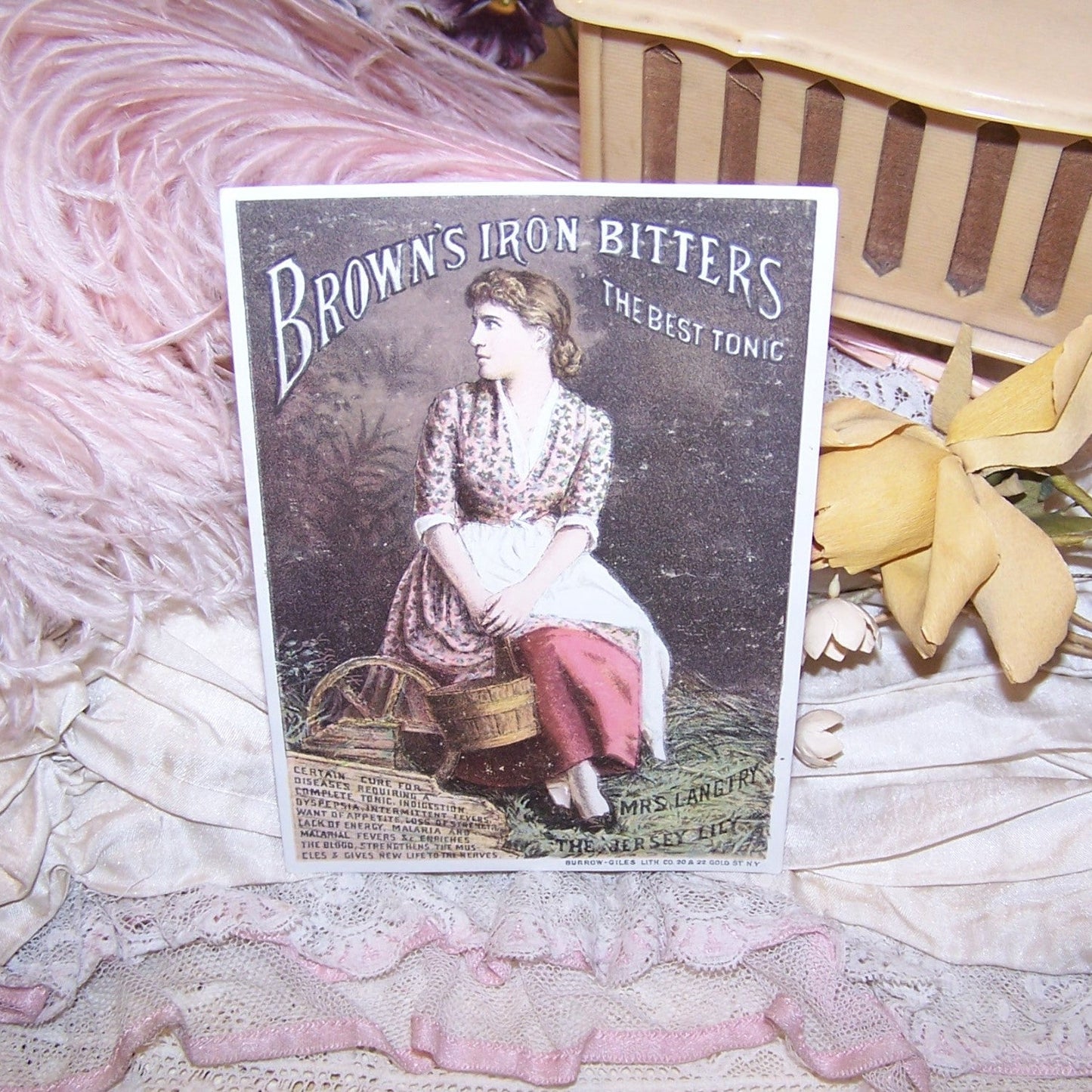 Antique Victorian trade card of Mys Lily Langtry aka The Jersey Lily for Brown's Iron Bitters. Mrs Langtry was the mistress of King Edward VII. Fine condition.
