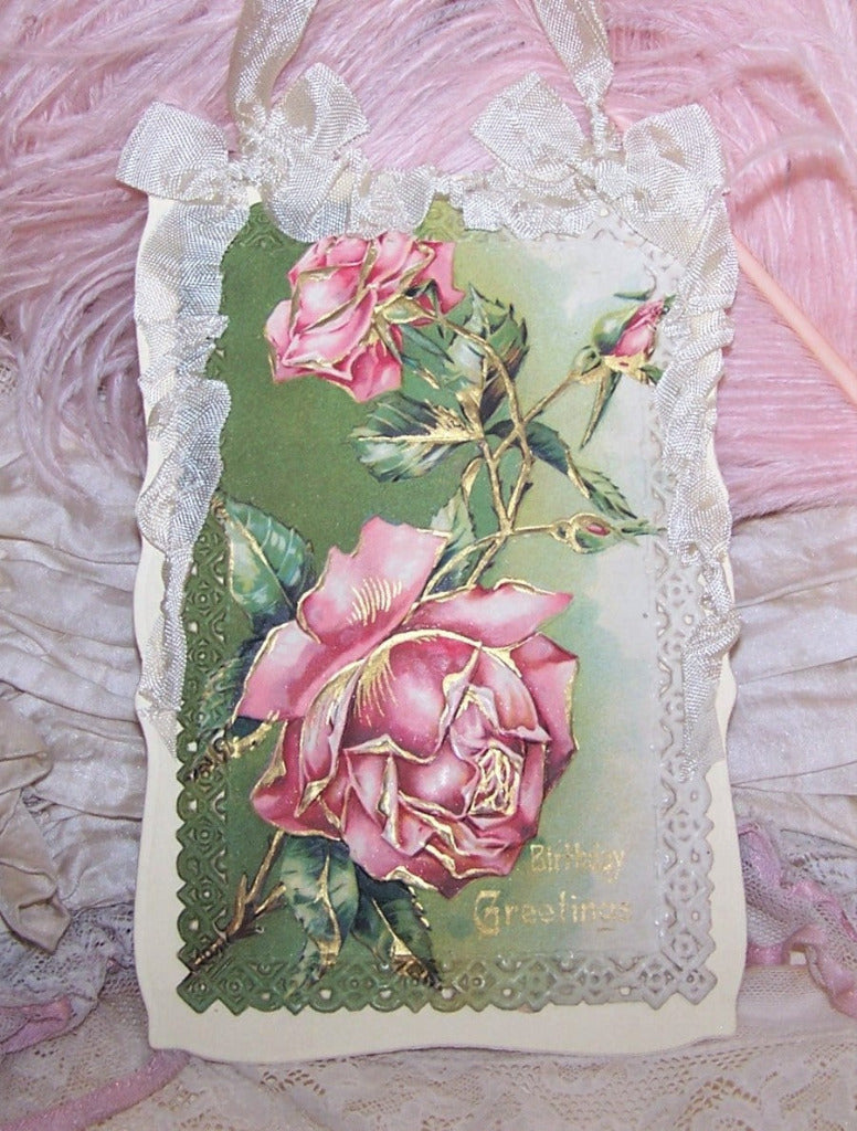 Repurposed Antique Postcard that displays pink roses along with the sentiment BIRTHDAY GREETINGS. Reverse is blank and has room to write your own message.