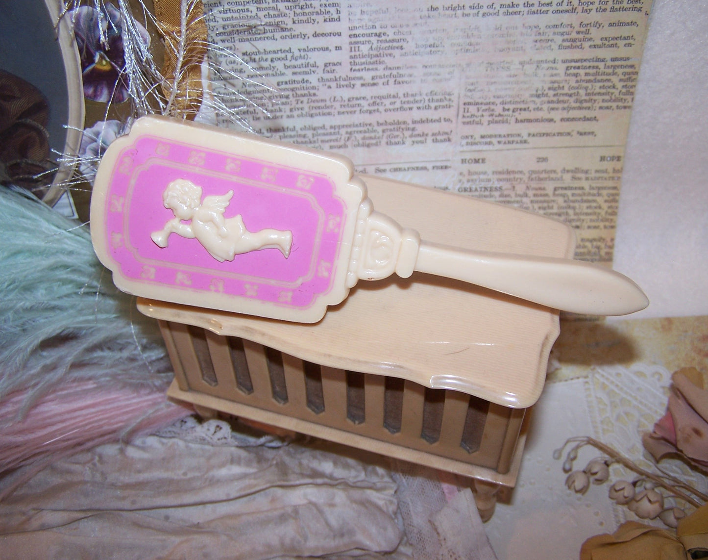 Vintage Pink/Cream Plastic Baby Brush - Cherub Blowing Trumpet