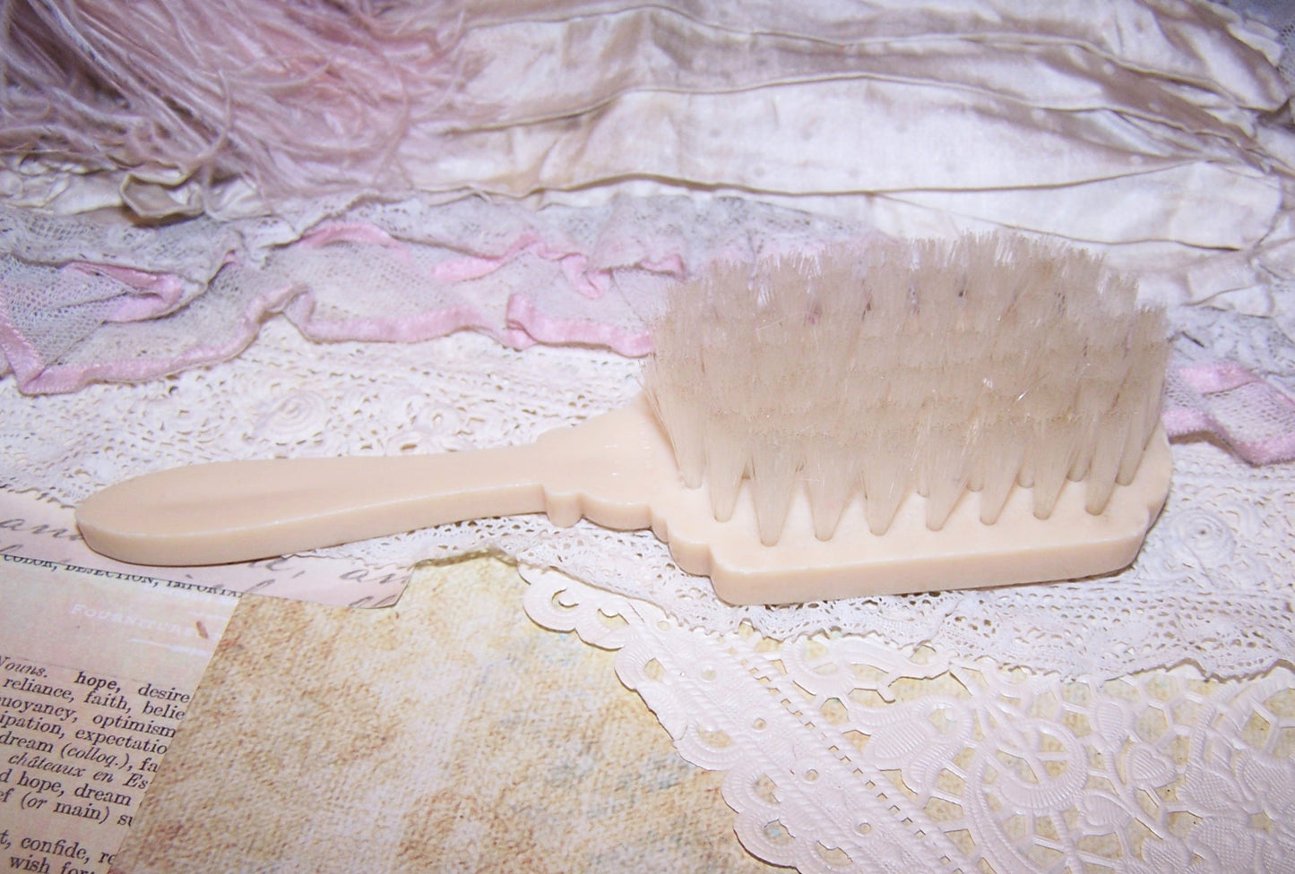 Vintage Pink/Cream Plastic Baby Brush - Cherub Blowing Trumpet