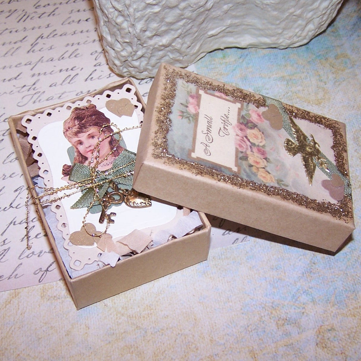A small mixed media gift box with everything you need to make a terrific impression on the giftee! A small paper box wraps "A Small Trifle".