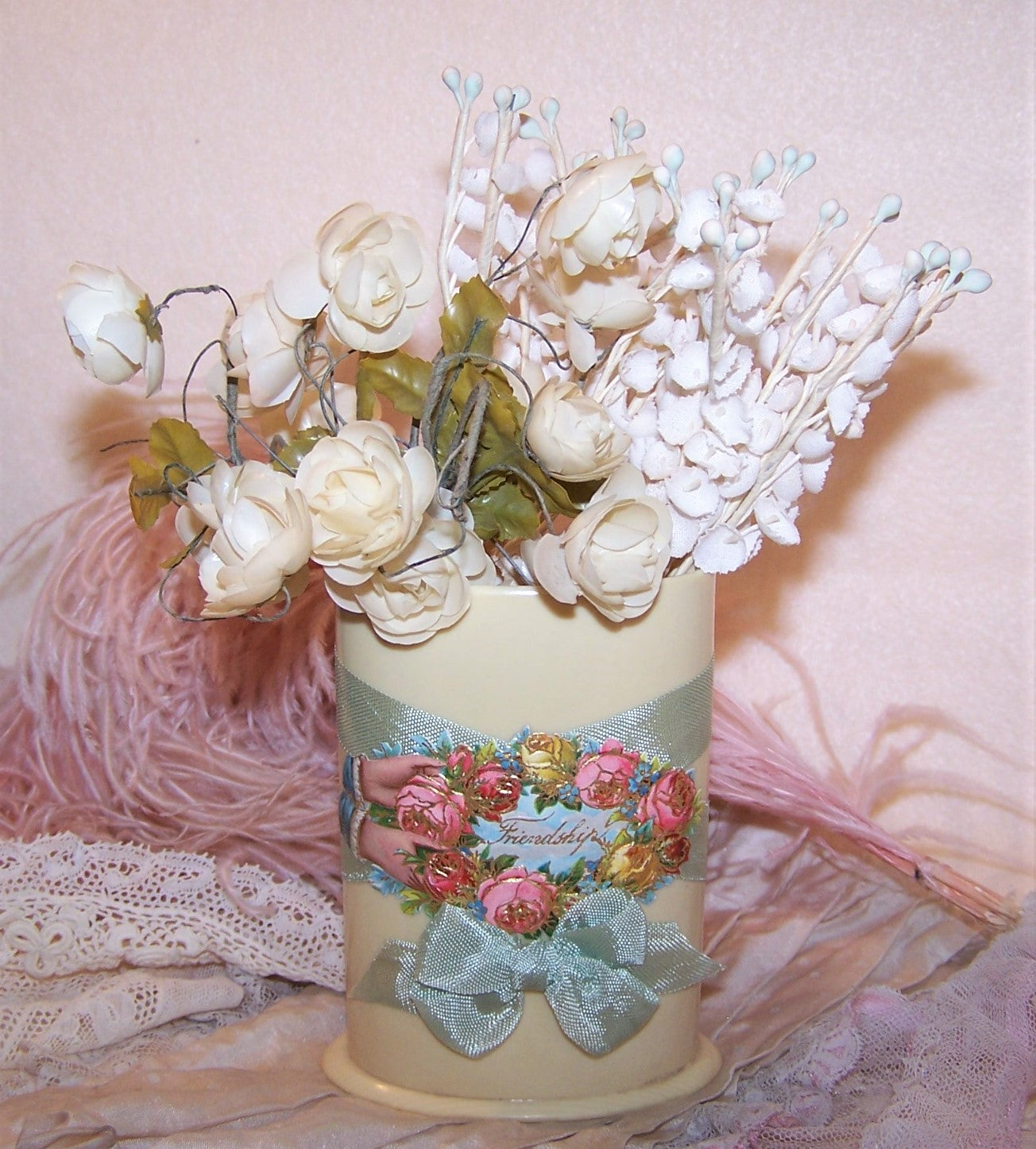 Upcycled 4" Art Deco celluloid toothbrush or pencil holder. Aqua rayon ribbon and a Victorian die cut transform the piece to a ONE OF A KIND creation.