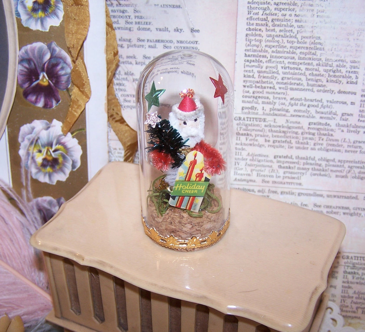 Vintage Japan Santa Claus with Christmas Tree & Art Deco sticker that reads HOLIDAY CHEER - all under a glass dome! Perfect mantel decoration. 3-1/4" x 1-1/2"