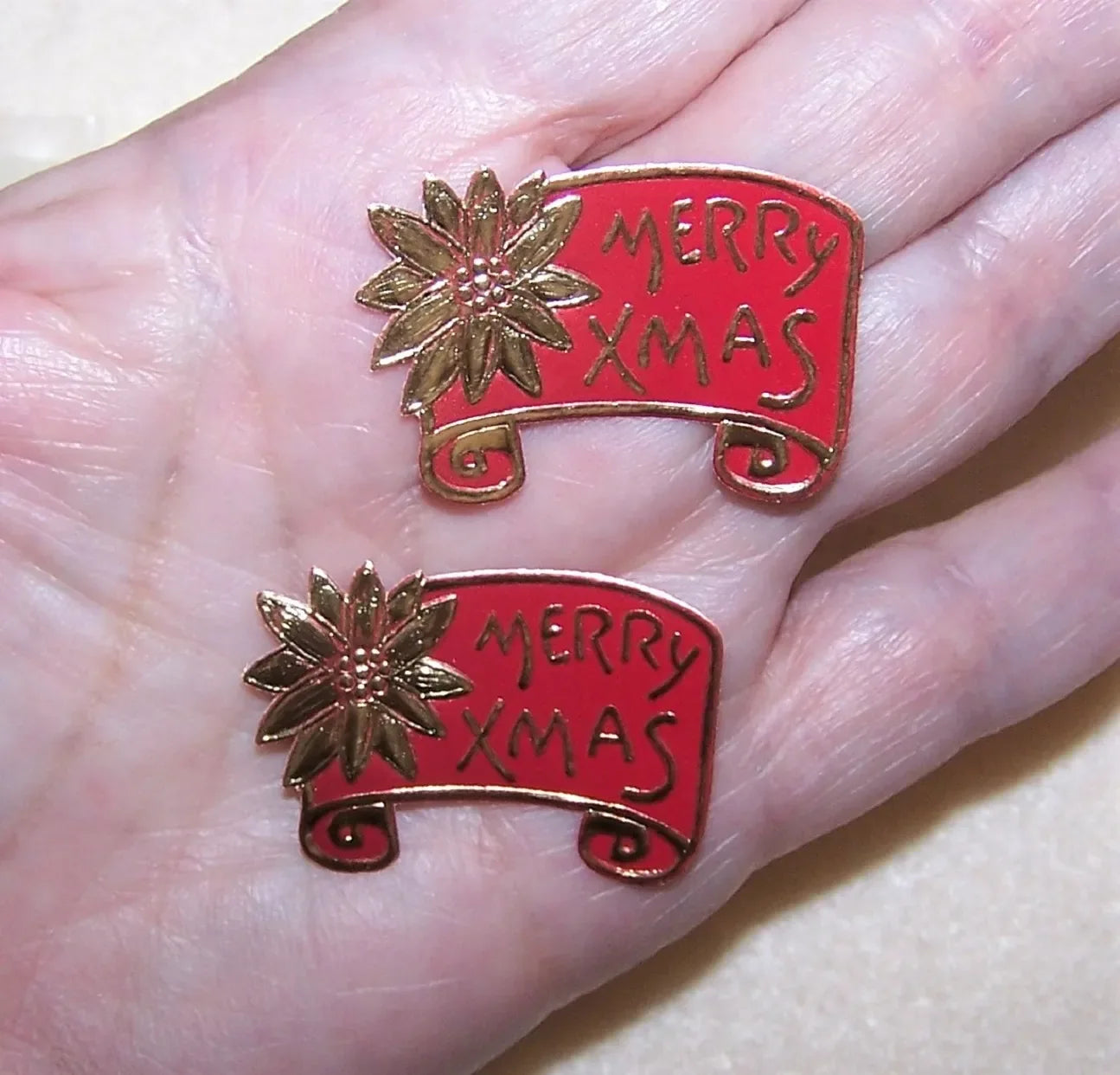 Set/5 vintage red & yellow gold foil gummed package stickers - seals for Christmas. Poinsettia graphics with Merry Xmas to the front. Size is 1-3/8" x 15/16".