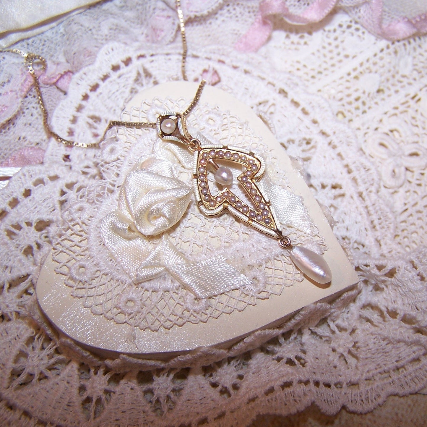 Antique Edwardian 14K Gold, enamel and natural pearl pendant / lavaliere crafted by Krementz. Button stud hallmark. 1-11/16" long - width is 9/16". 2.7 grams.