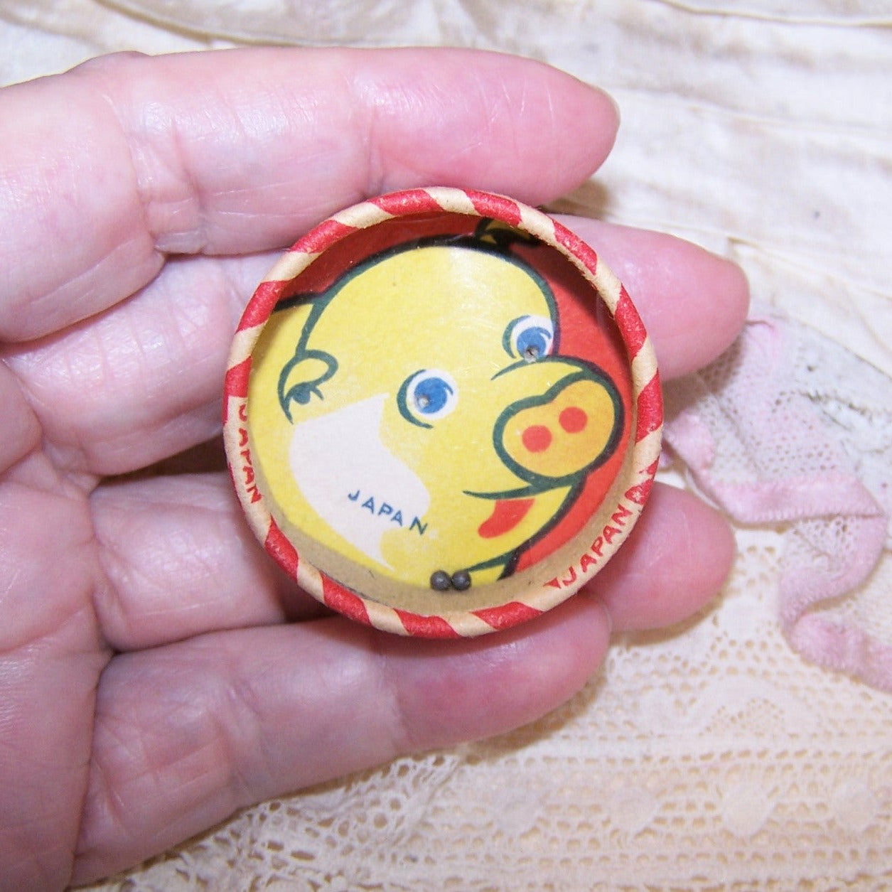 Vintage Made in Japan dexterity puzzle of paper and plastic. Just put the steely eyes into the pig. Height is about 1/2". Excellent condition for display.