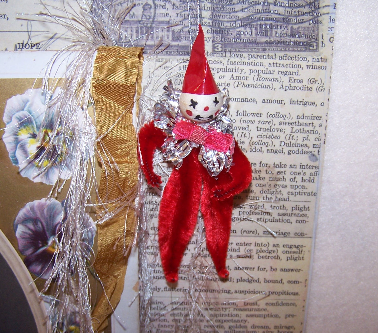 Repurposed 1960s Made in Japan red chenille clown Christmas holiday ornament. Spun cotton face with silver foil collar. Silver cord for hanging.
