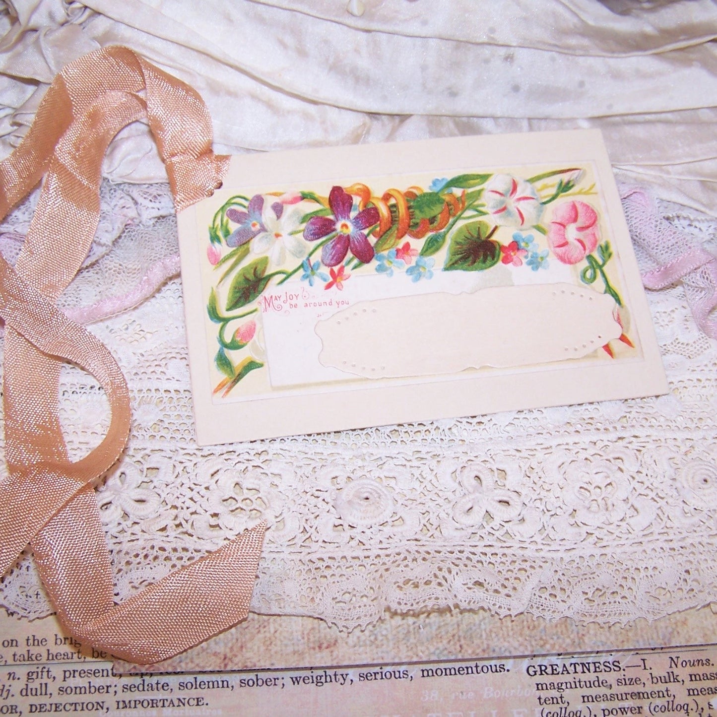 Antique Victorian mixed media gift tag/package decoration. Front of card displays florals; sentiment is MAY JOY BE AROUND YOU. Reverse is blank. OOAK!