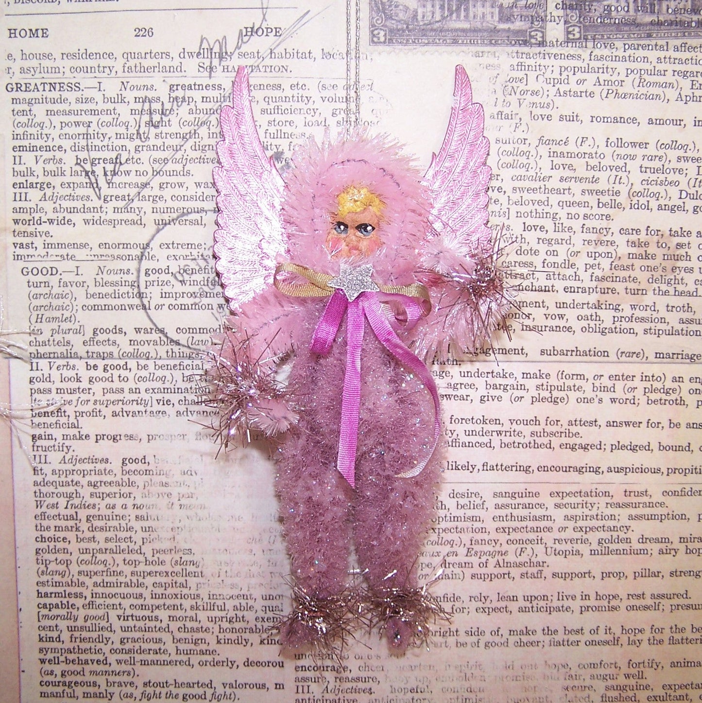 Handcrafted OOAK Pink/Mauve Chenille Guardian Angel. For Christmas or any day, the little girl has a face of handpainted clay. 5-1/2" x 2-1/2". Lightweight.