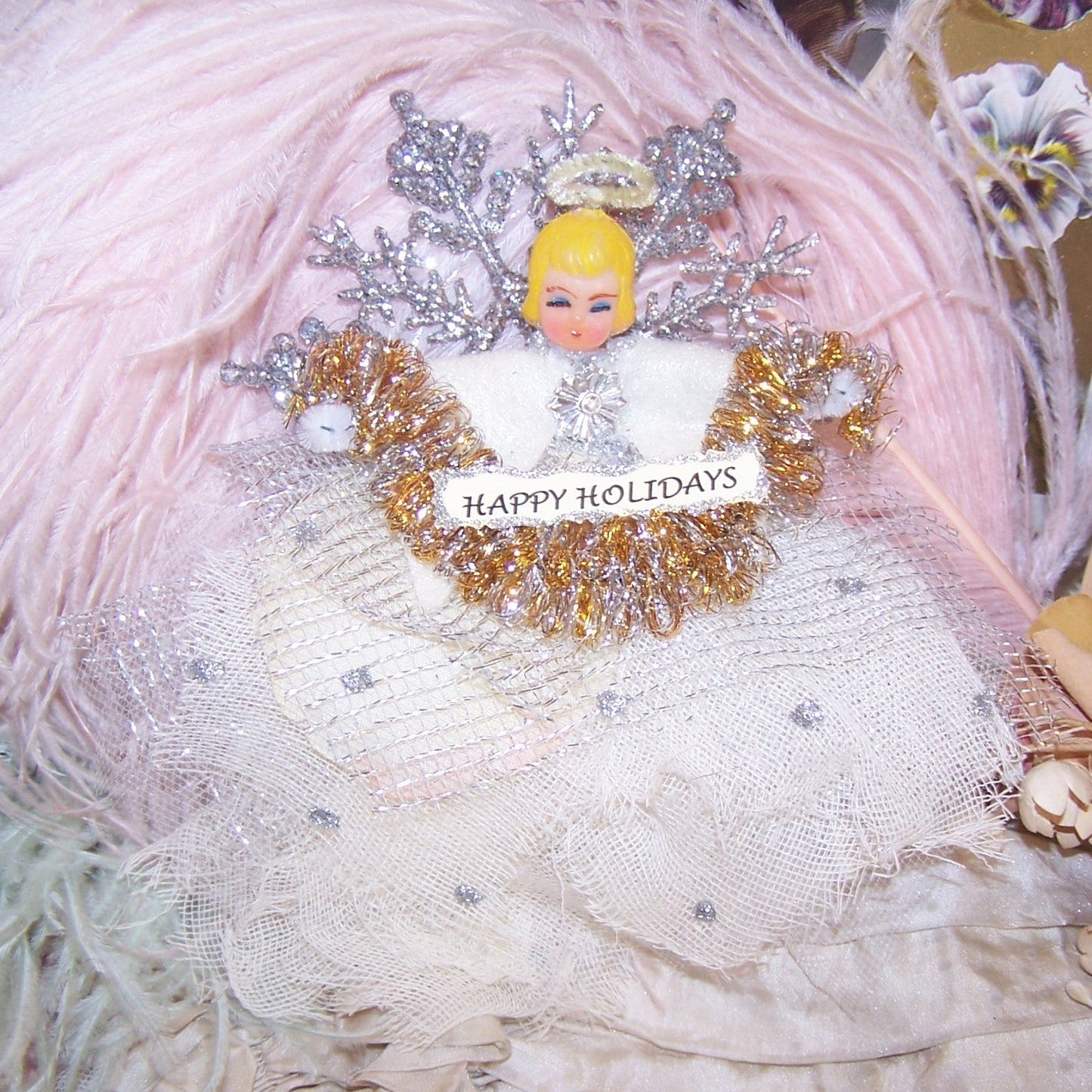 Take a vintage Made in Japan plastic angel head and add a new body. The result? An angel ornament that can be used for any occasion. Happy Holidays!