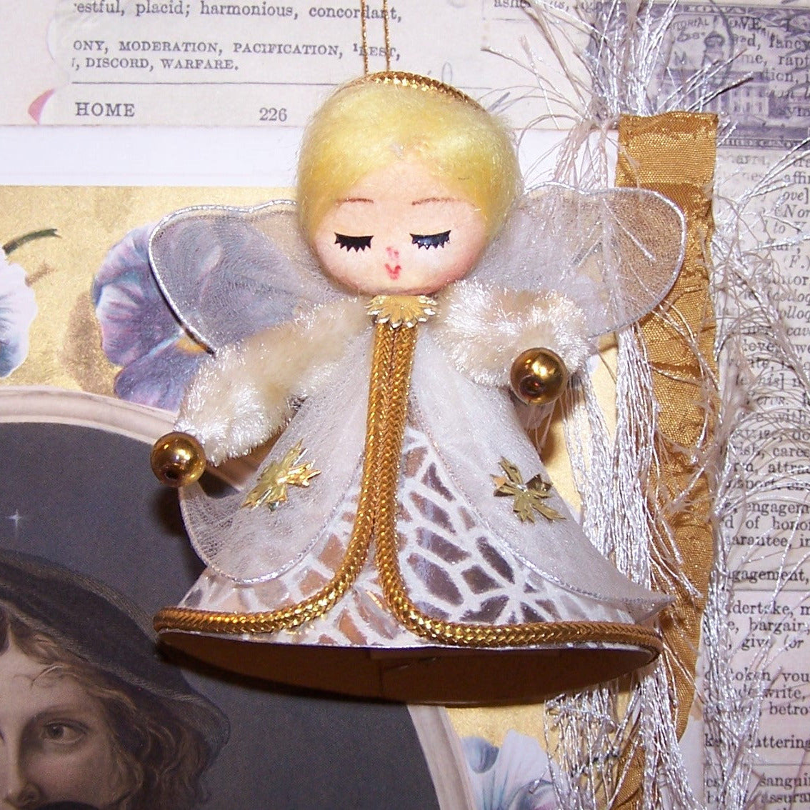 Vintage Made in Japan Christmas ornament designed as an angel. Made of mixed materials, 3-3/4" high x 3" wide. Original price tag. Excellent condition.