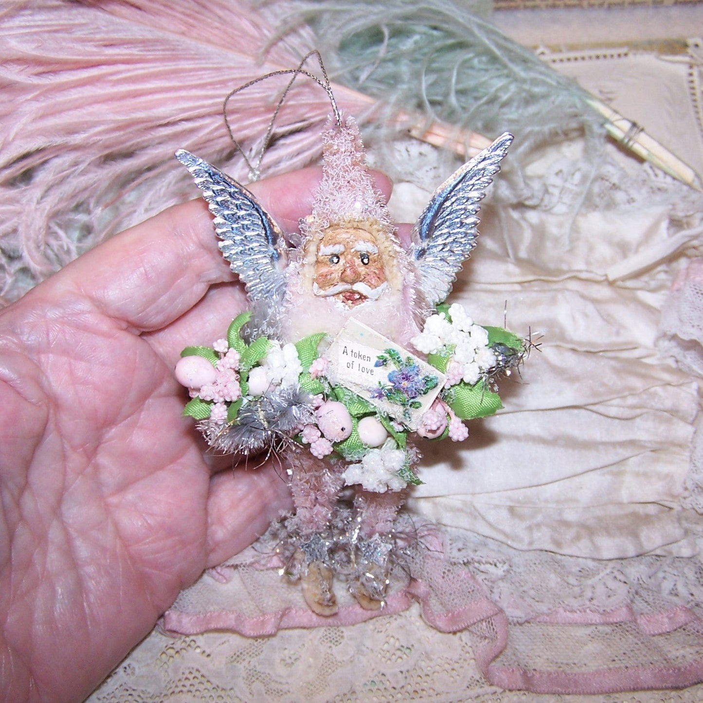 Santa Claus in PINK? Sure, why not! Made of Chenille with a handpainted clay face, my Christmas ornament also sports silver wings! 4-1/2" high. OOAK!