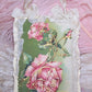 Repurposed Antique Postcard that displays pink roses along with the sentiment BIRTHDAY GREETINGS. Reverse is blank and has room to write your own message. 