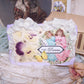Handcrafted everyday greeting card/ornament of mixed materials.  Two Angels, Pansies and a Butterfly.  Sentiment is SIMPLY DIVINE.  Rayon Ribbon Hanger.
