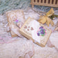 Original design mixed media TOKEN OF LOVE - a porcelain hand extended in friendship.  In a personalized gift box, the ornament is dressed in pastel colors.  