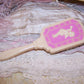 Vintage Pink/Cream Plastic Baby Brush - Cherub Blowing Trumpet