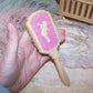 Vintage Pink/Cream Plastic Baby Brush - Cherub Blowing Trumpet