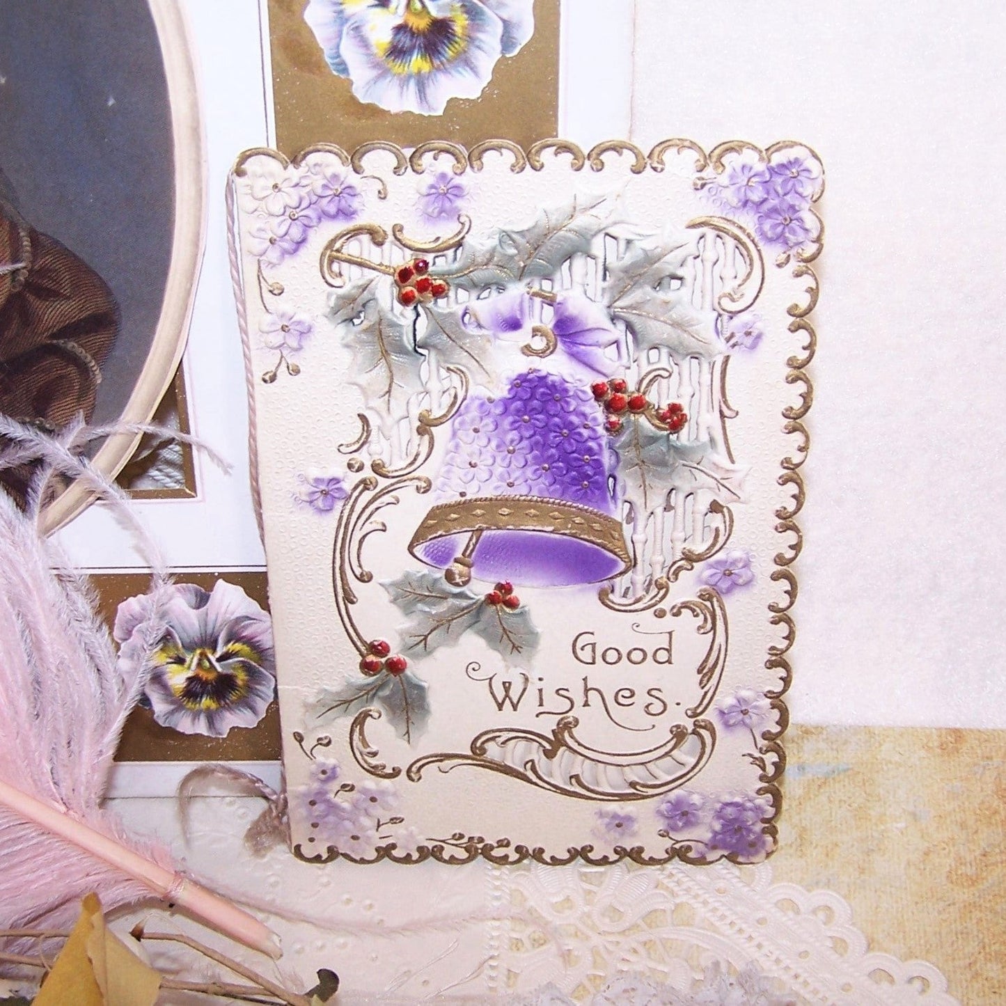 Unused Antique Victorian embossed greeting card for the New Year.  Inside reads GOOD WISHES and SENT IN ALL SINCERITY. Original cord is present. Fine condition.