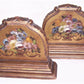 A pair of Art Deco era handpainted bookends in an elegant romantic shabby chic style. The front of each has a handpainted design of flowers in a vase. 