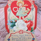 1920s Fold Down Honeycomb Valentines Day Card | Little Girl Carrying Flowers