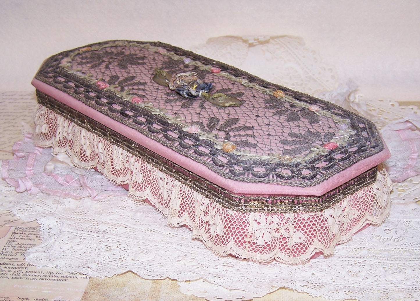 French Art Deco Boudoir Box. Mauve fabric with gold lace trim and rococo ribbon rose trim.  Very fine condition with decorative floral embellishment.  