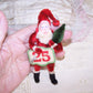 December 25 Christmas Ornament - Chenille Santa Claus Carrying Tree