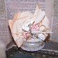 Victorian Revival oval chipwood trinket box decorated with ribbon and florals in tones of cream and mauve.  Sentiment is TO MY DEAREST FRIEND. 