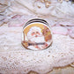 Repurposed Antique French pharmacy pill box.  The lid bears an image of Santa Claus in golden tones. Sentiment on top is MERRY CHRISTMAS; nothing on the inside.