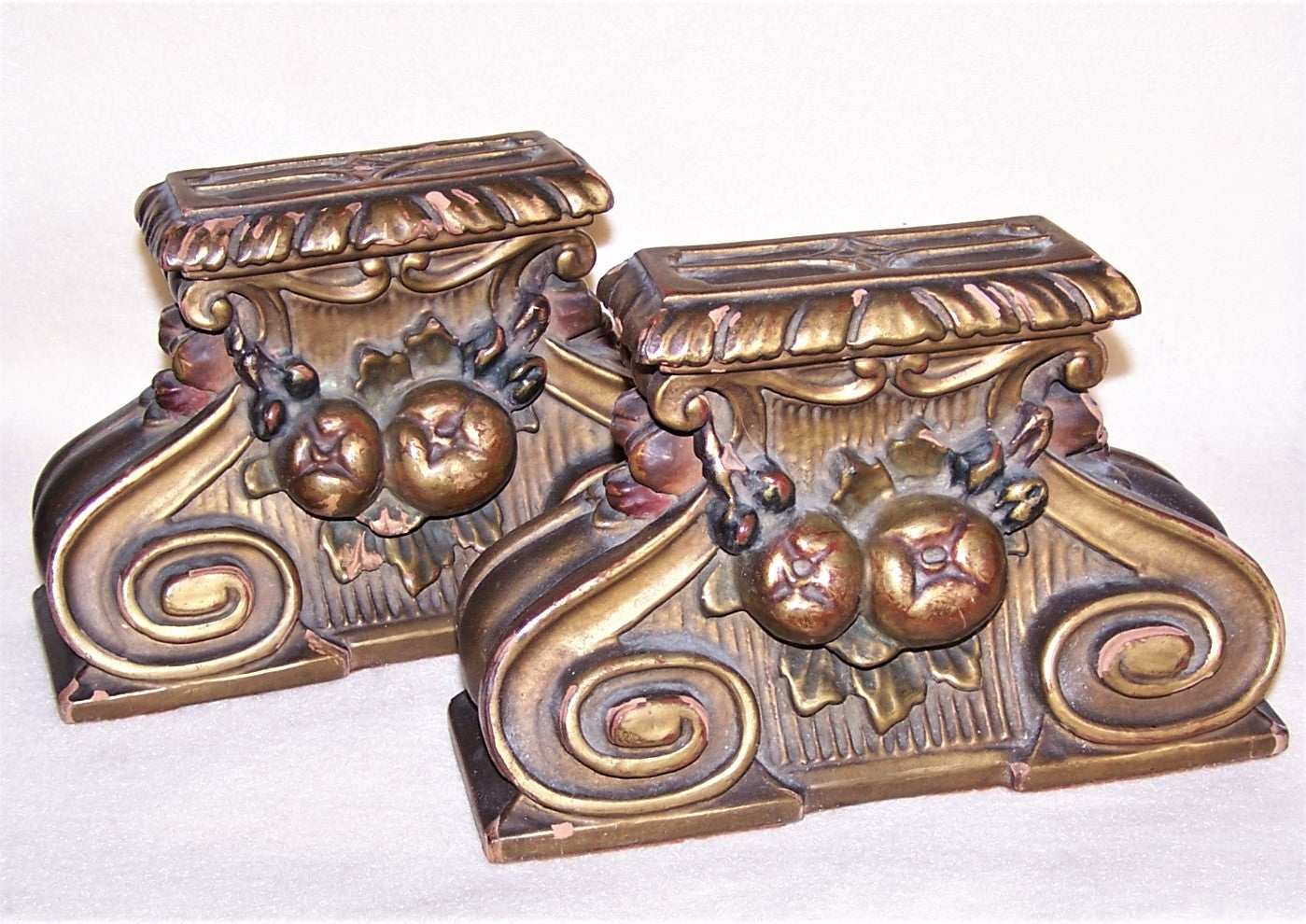 Art Deco Bookends in a Della Robbia "bough of fruit" design.  Shabby Chic condition.  Gold, Burgundy, Blue, Brown color.  Set of 2.  Felted Bottoms.  