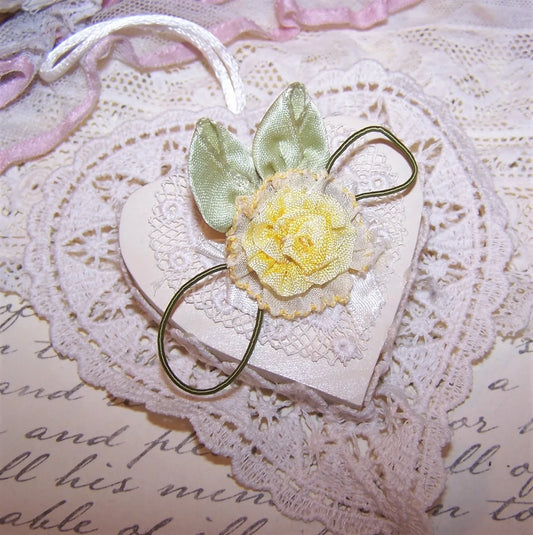 Vintage USA ribbonwork - French Ombre Yellow ribbon upon vintage organza. Leaves are mint green satin; dark green cord loops. 2-1/2" wide x 1-1/2" high. 
