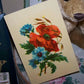 Antique Victorian C.1883 high gloss chromolithograph of a small floral spray - a red Poppy and blue Anemones. Size is 4-5/8" x 7". Condition is very nice. 