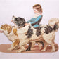 Large 6 inch antique victorian die cut of a young girl holding onto two dops - one blonde and white, the other black and white.  From an old scrapbook album.  No paper loss.  Glue residue on the reverse.