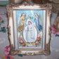 Souvenir of First Communion concoction.  A 4" x 5" metal frame, an Antique French religious card and Victorian Communiante (girl) die cut compose the piece.  