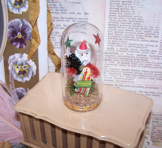 Vintage Japan Santa Claus with Christmas Tree & Art Deco sticker that reads HOLIDAY CHEER - all under a glass dome! Perfect mantel decoration. 3-1/4" x 1-1/2"