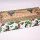 Art Nouveau Christmas paper and antique celluloid handpainted Gloves gift box.  Holly and berries design.  9-3/4" long.  Very clean.  Presents beautifully.