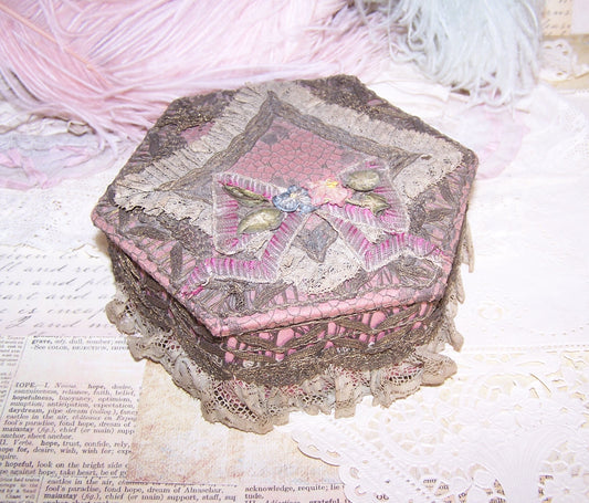 French Art Deco Boudoir Box - Trinket Box. Pinky-mauve fabric covered in gold lace, embellished with rococo ribbon roses and trim. Inside mirror with age.