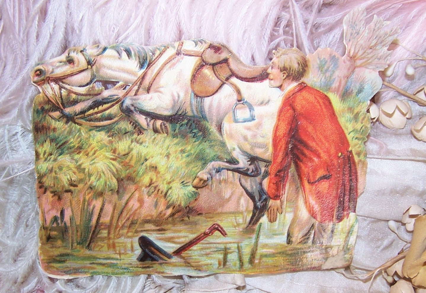 Pristine Antique Victorian die cut depicting a horse that has thrown his rider. High color, no glue or paper residue to the back. 4-1/2" x 3" approx. 