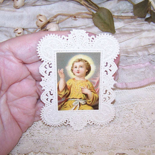 Napoleon III paper lace card gifted during Confirmation or First Communion or simply used as a prayer card. Infant Jesus chromolithograph. 2-1/2" x 3-3/8". 