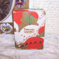 Art Deco Christmas box in red, green and gold. Graphics are Santa's sleigh / reindeer and a Dresden paper message - Christmas Greetings. 4" x 3" x 1-1/2" deep. 