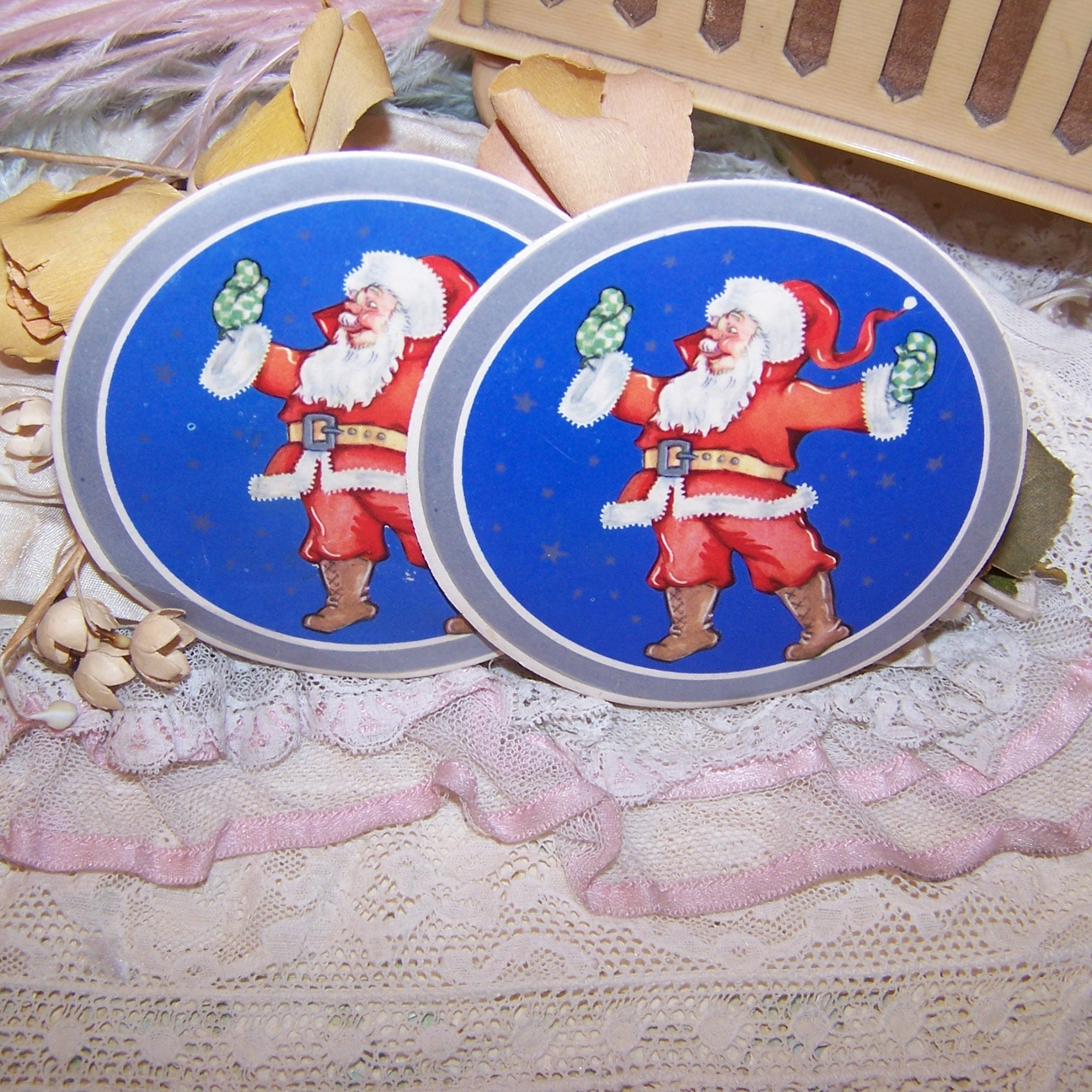 4 Art Deco gummed round Christmas Stickers with the image of Santa Claus.  Very jolly graphic.  Unused condition - vintage patina to the paper. Unknown maker. 