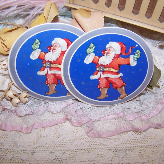 4 Art Deco gummed round Christmas Stickers with the image of Santa Claus.  Very jolly graphic.  Unused condition - vintage patina to the paper. Unknown maker. 