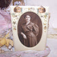 Rectangular celluloid wall frame with graphics of angels & stars.  Easy change of photo to your own image.  No glass.  6-3/8 x 4-1/4. Image size is 5" x 3". 