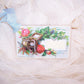 Compliments of the Season.  Re-useable gift tag / card made of cardstock, plastic and an Antique Victorian calling card.  Red Roses and Jewelry Casket graphics.