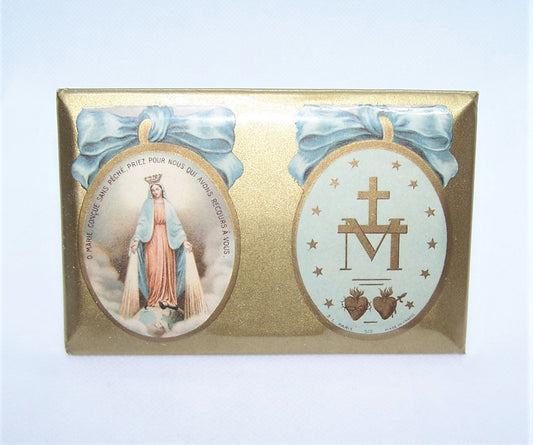 Vintage celluloid front religious icon for a child's Birth or Christening. The design is very soft in pastel tones with blue bows. 4-1/2" x 3". Metal easel.