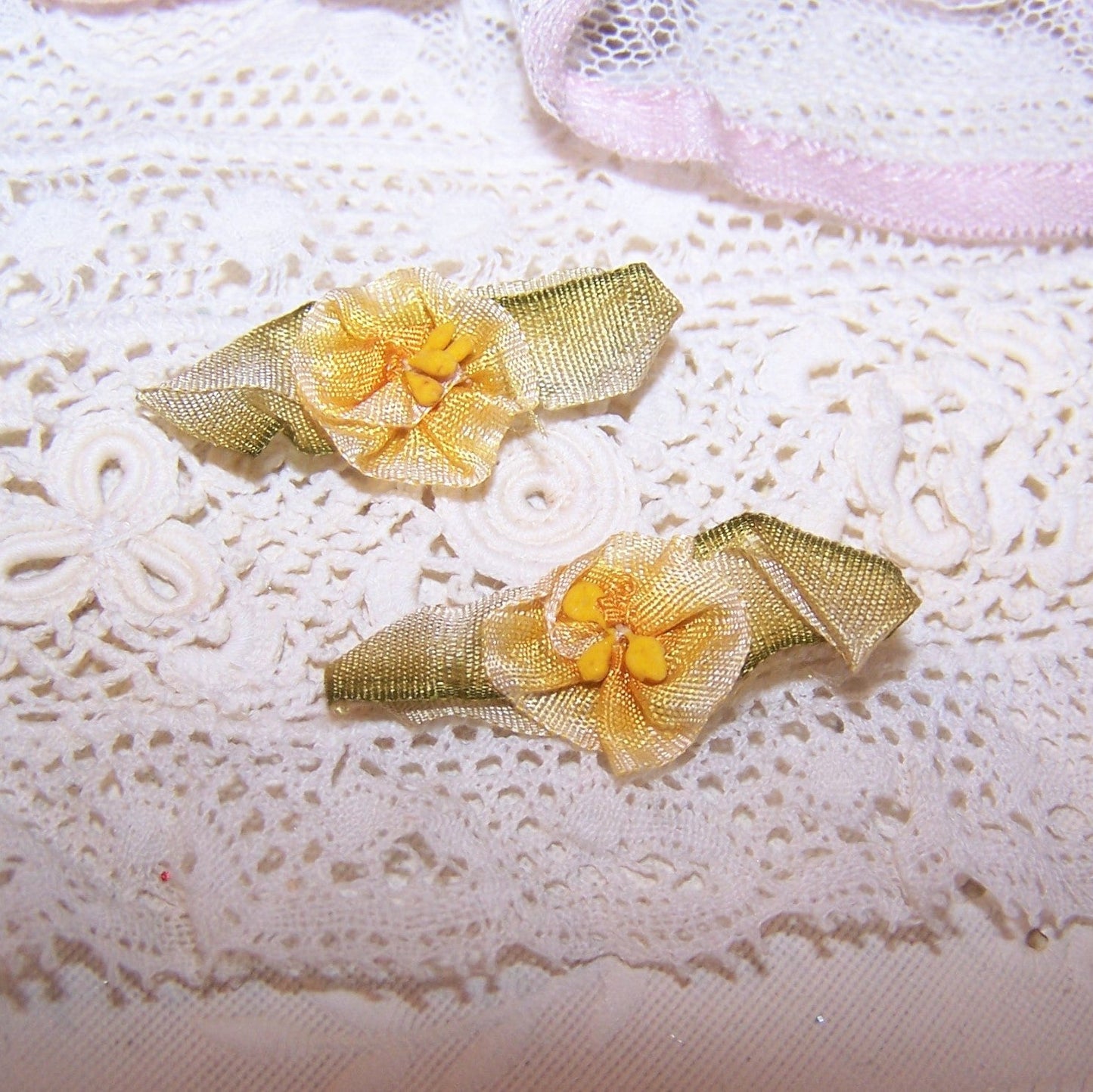 Pair French ribbon florals from an old dress. Yellow silk ombre flower with pips.  Olive green ombre ribbon leaves. 1-3/16" x 1/2" approx. Totally handsewn.