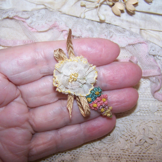 Antique French ribbonwork - a yellow organza flower, seed beads at the center; floss embroidery end with Beige flourish.  1-7/8" x 1" approx. Handsewn.