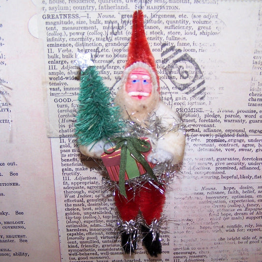 Tangled in tinsel, here's a chenille / clay face Santa Claus Christmas ornament - a ONE OF A KIND design using modern and vintage materials.   5-1/4" high.
