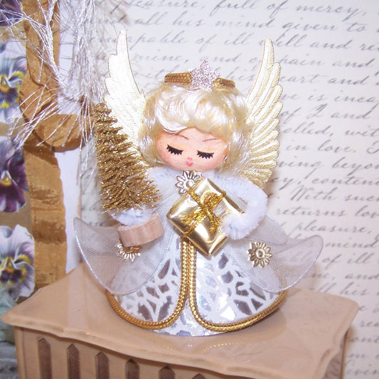 Upcycled Made in Japan Christmas angel ornament. Made of mixed materials, she stands 3-3/4" high x 3" wide. Original price tag. Excellent condition.