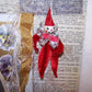 Repurposed 1960s Made in Japan red chenille clown Christmas holiday ornament.  Spun cotton face with silver foil collar. Silver cord for hanging. 