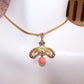 Antique Edwardian 14K Gold, enamel, natural pearl and coral pendant / lavaliere crafted by Krementz. Button stud hallmark.  1" long x 7/8" wide.  2.1 grams.